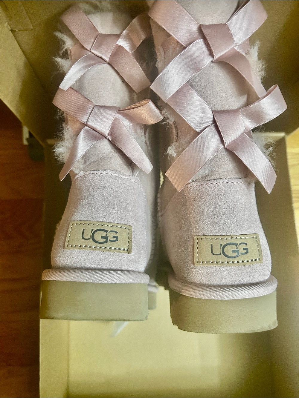 UGG Kids Blush Pink Ribbon Back Shearling Boots